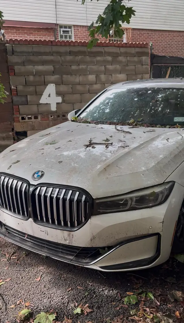Before: BMW 740i — hood & front